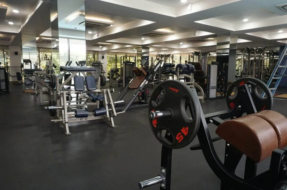 Gym floor with weight machines and free weights