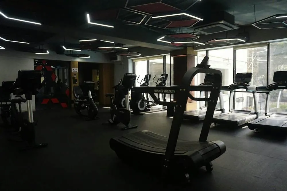Row of treadmills in an air-conditioned gym